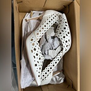 Gently used justfab shoes in the box.